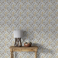 Vintage Foliage Golden and Gray wallpaper above a wooden console with chevron lamp in an entryway