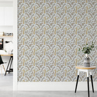 Vintage Foliage Golden and Gray wallpaper beside a white desk and black chair in a home office
