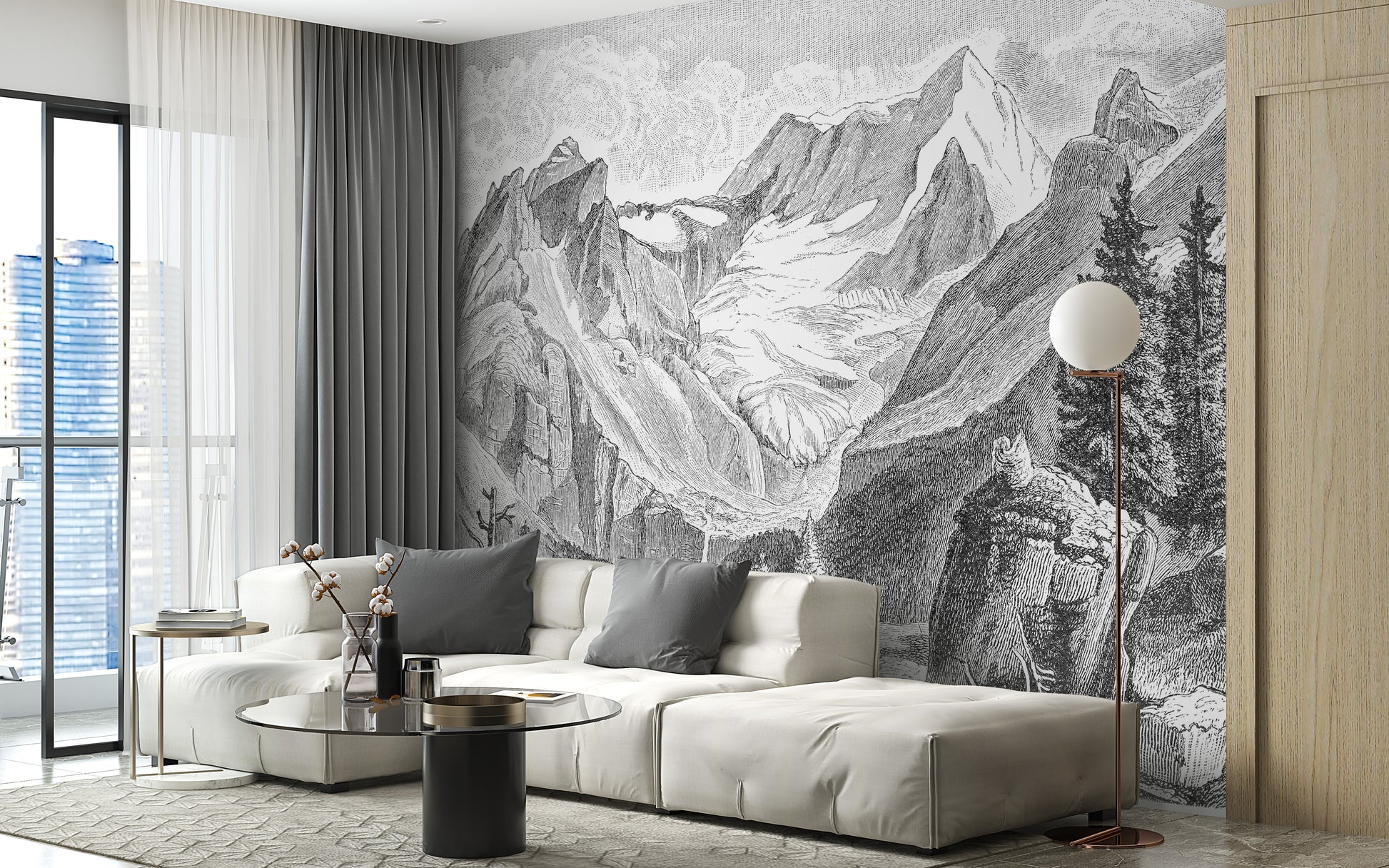 Vintage Mountain wallpaper mural of etched alpine peaks behind a cream sofa with grey pillows in a living room