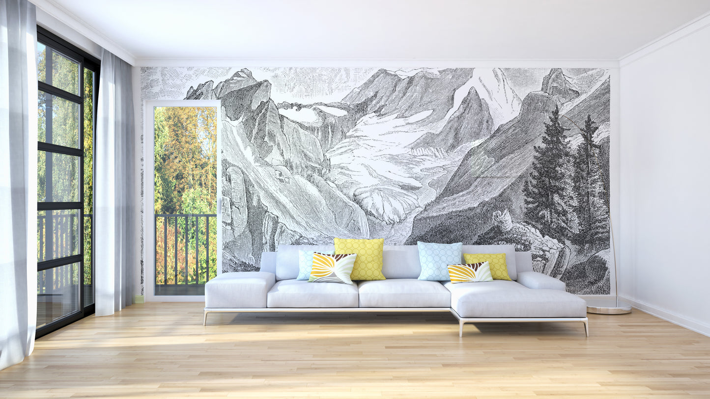 Vintage Mountain wallpaper mural in grey engraving style behind a light grey sofa in a sunny living room