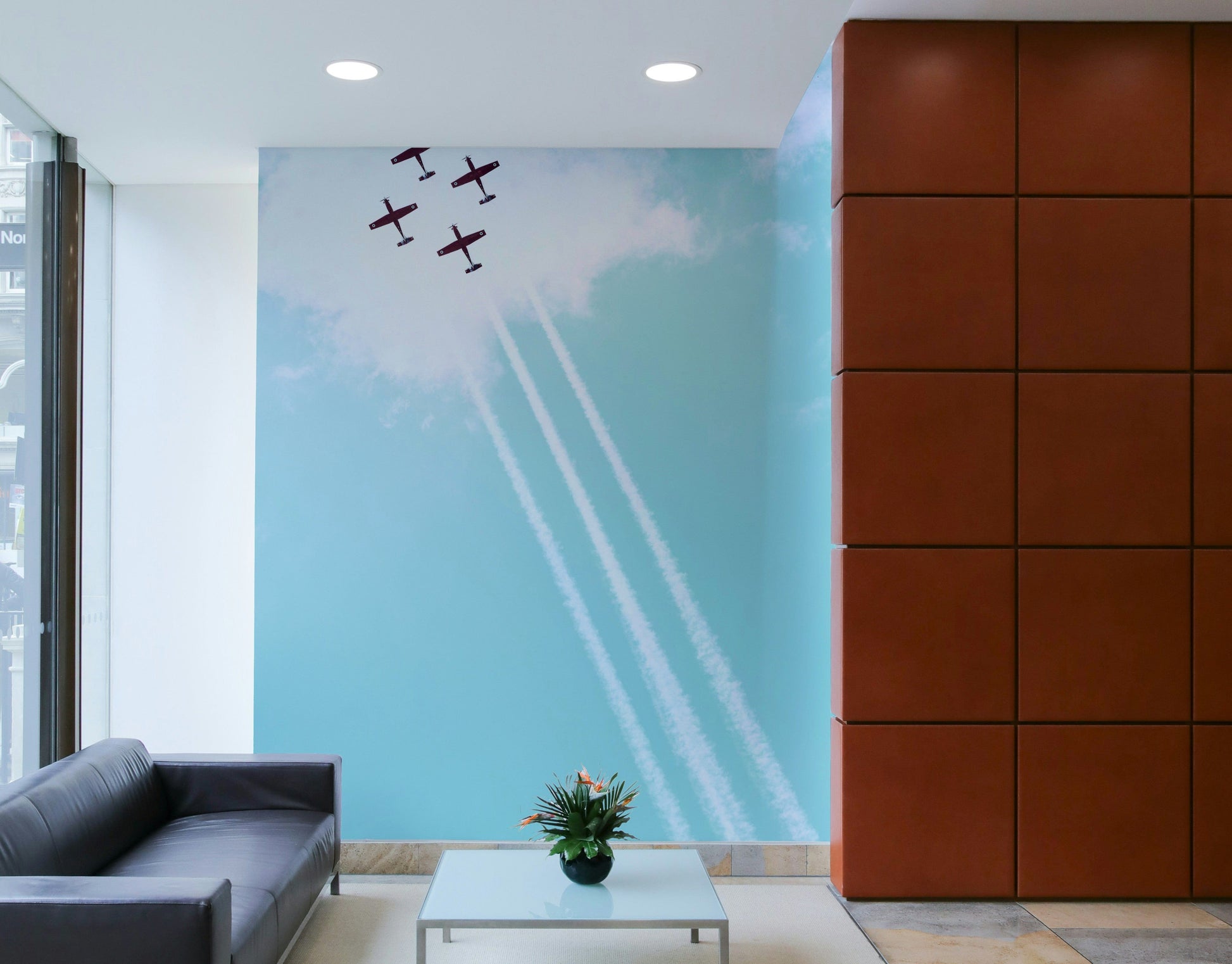 The wallpaper is used as a feature wall in a bedroom.