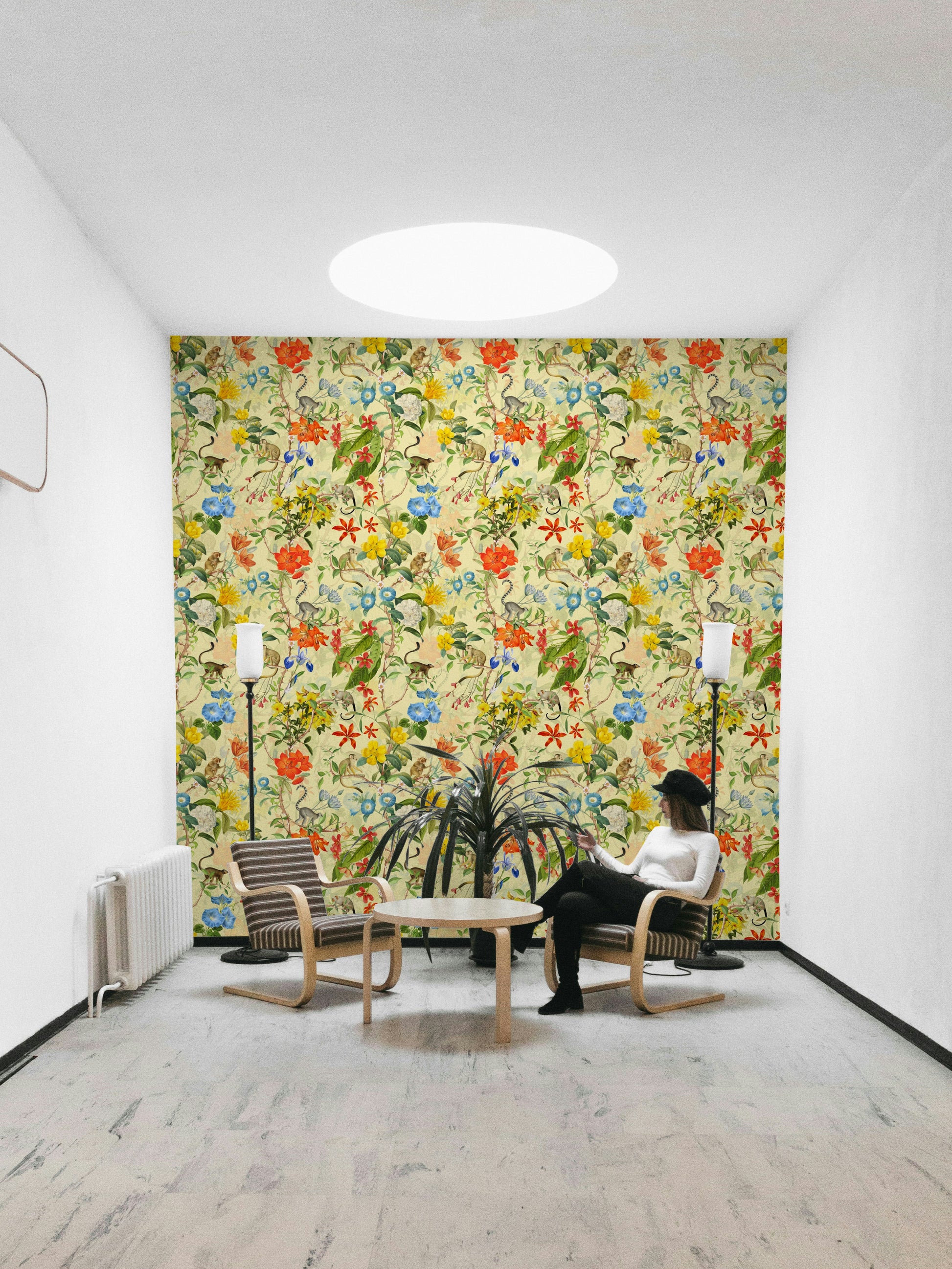 Richly illustrated primate wallpaper with vivid botanical elements.

