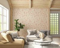 Retro travel wallpaper mural filled with repeating suitcase, hat, and traveler illustrations.