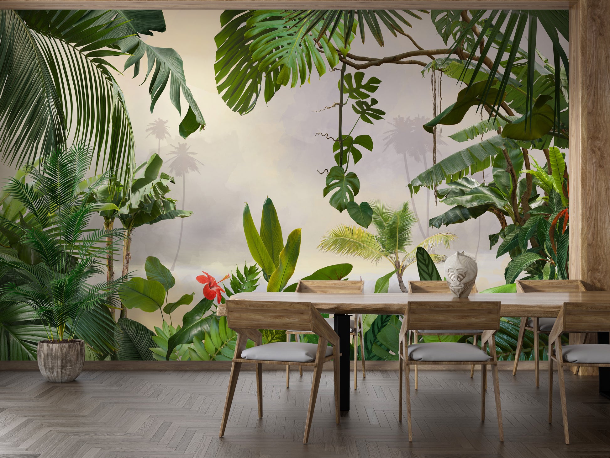 Green Tropical Forest Trees wallpaper mural styled as a feature wall behind a dining table and chairs in green tones