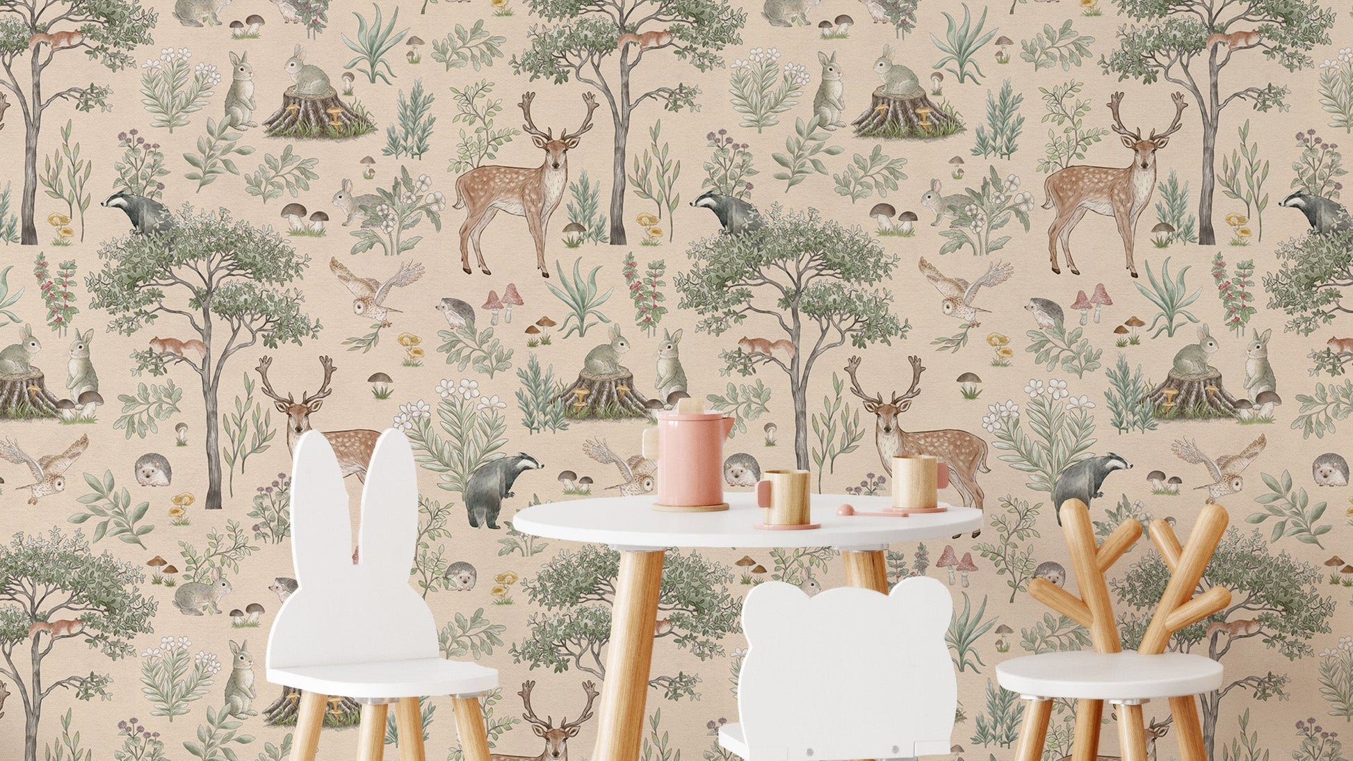 Warm Beige Wildlife wallpaper with deer and woodland animals behind a kids table with bear and bunny chairs