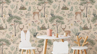 Warm Beige Wildlife wallpaper with deer and woodland animals behind a kids table with bear and bunny chairs