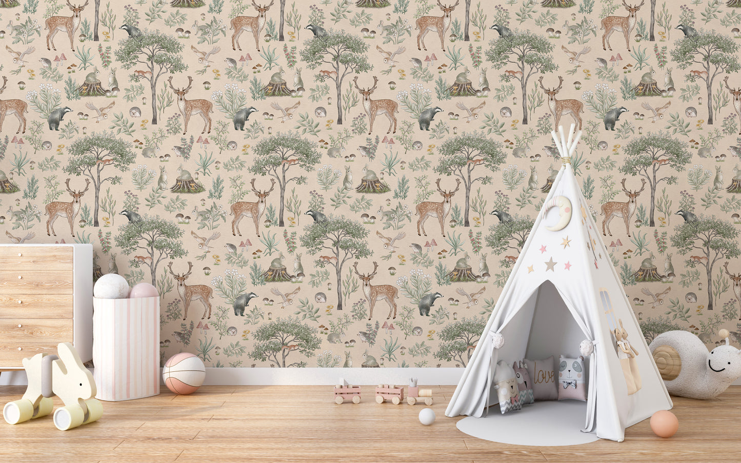 Warm Beige Wildlife wallpaper behind a white teepee tent with a pink star cushion and wooden toy cart