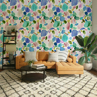Freeform brushstroke mural in deep and soft blue hues.

