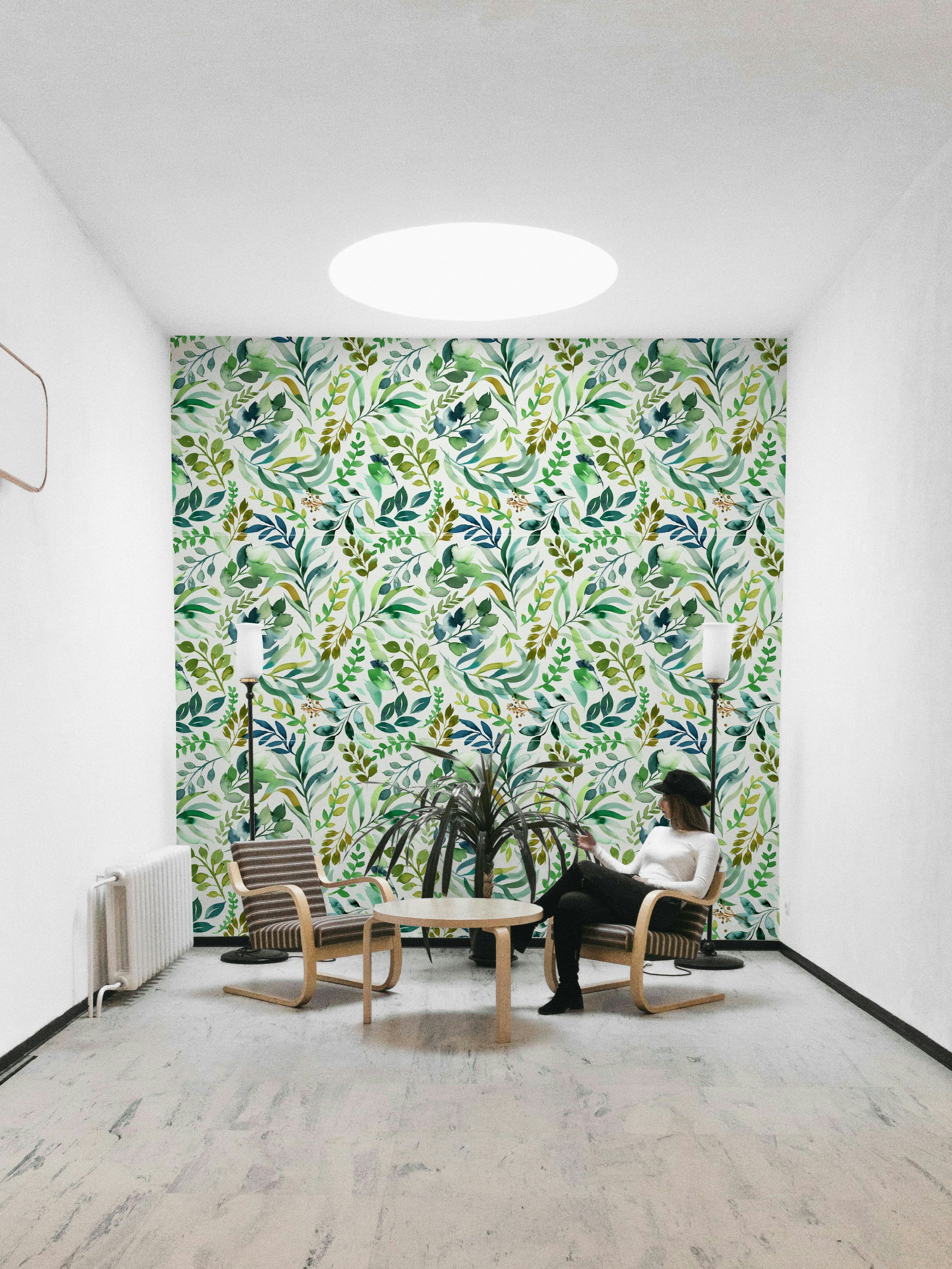 Watercolor-style leaves creating a relaxed, organic feel.

