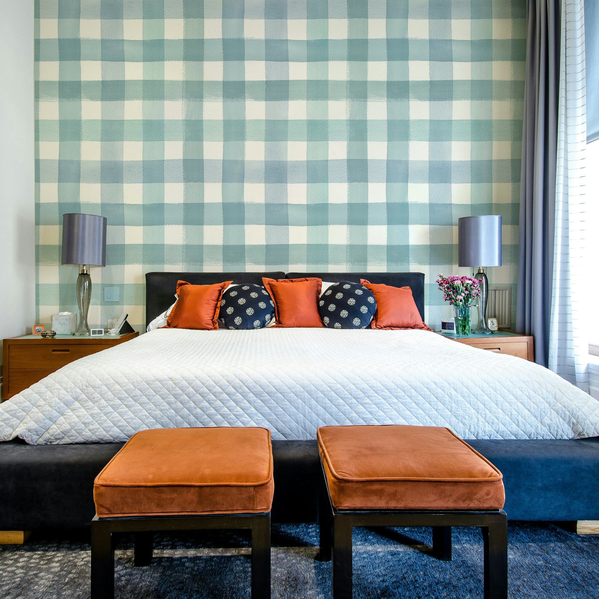 Wallpaper with gentle blue gingham checks on a light background.


