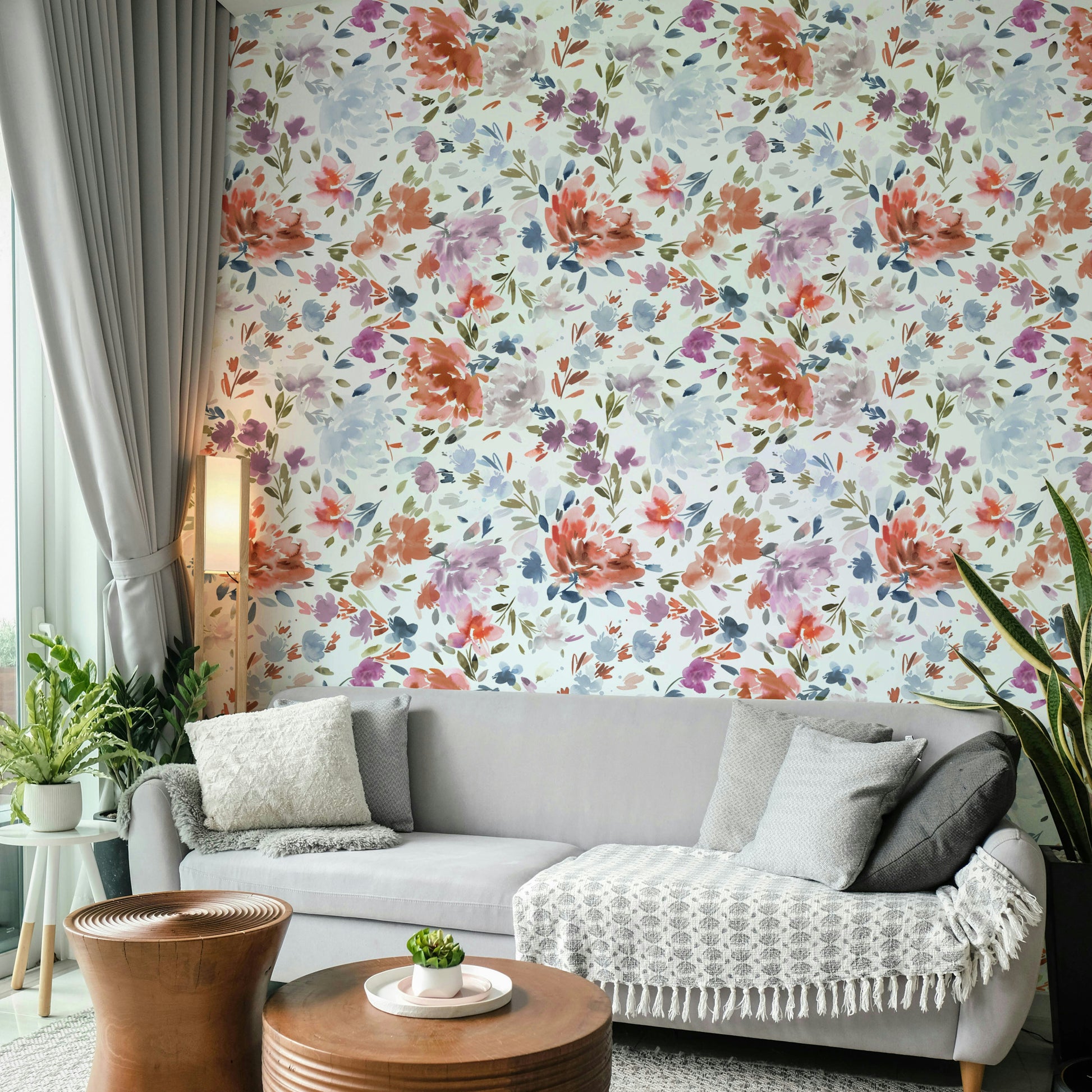 Artistic mural with red and blue roses on a light watercolor background.

