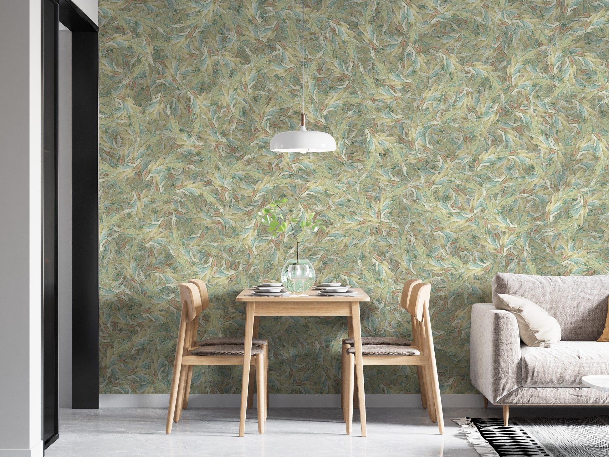 Watercolor Dancing Green Leaf wallpaper mural in a dining nook with a wooden table, chairs and grey sofa