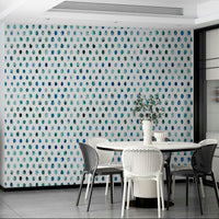 Hand-painted blue dots in various shades for a relaxing look.

