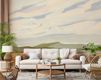 Vibrant landscape mural wallpaper capturing breezy day on grassy slopes.