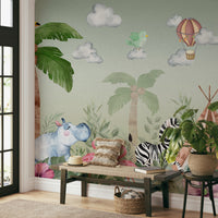 The colors are gentle and lush, with a natural, green and gray palette.

