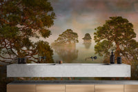 Watercolor Lake Sunset Forest wallpaper mural above a long white stone double vanity in a bathroom