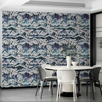 Blue and mauve mountain mural with a serene landscape view.

