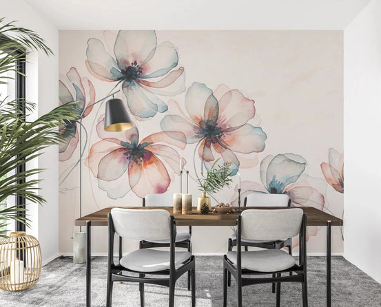 Watercolor Petals wallpaper mural of peach and teal cosmos flowers behind a wood dining table with black chairs