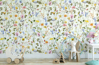 Wall mural with a watercolor wildflower meadow.

