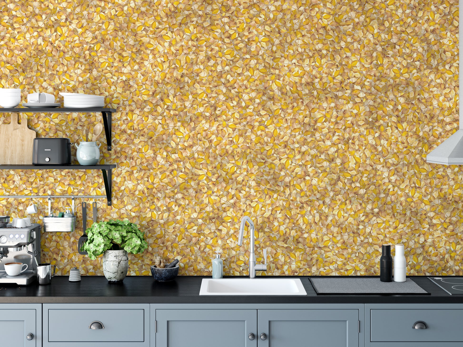 Watercolor Yellow Leaves wallpaper mural above grey kitchen cabinets and a sink with espresso machine