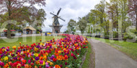 Dutch countryside mural with floral garden path

