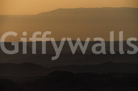 A detail of the warm tones in the desert and sky.

