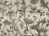The wallpaper displays hand-drawn floral stems that create a peaceful and graceful spring atmosphere.