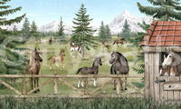 Scenic animal wall mural with horses running near pines and mountain backdrop