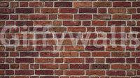 Vintage brick mural with worn edges and natural brick pattern