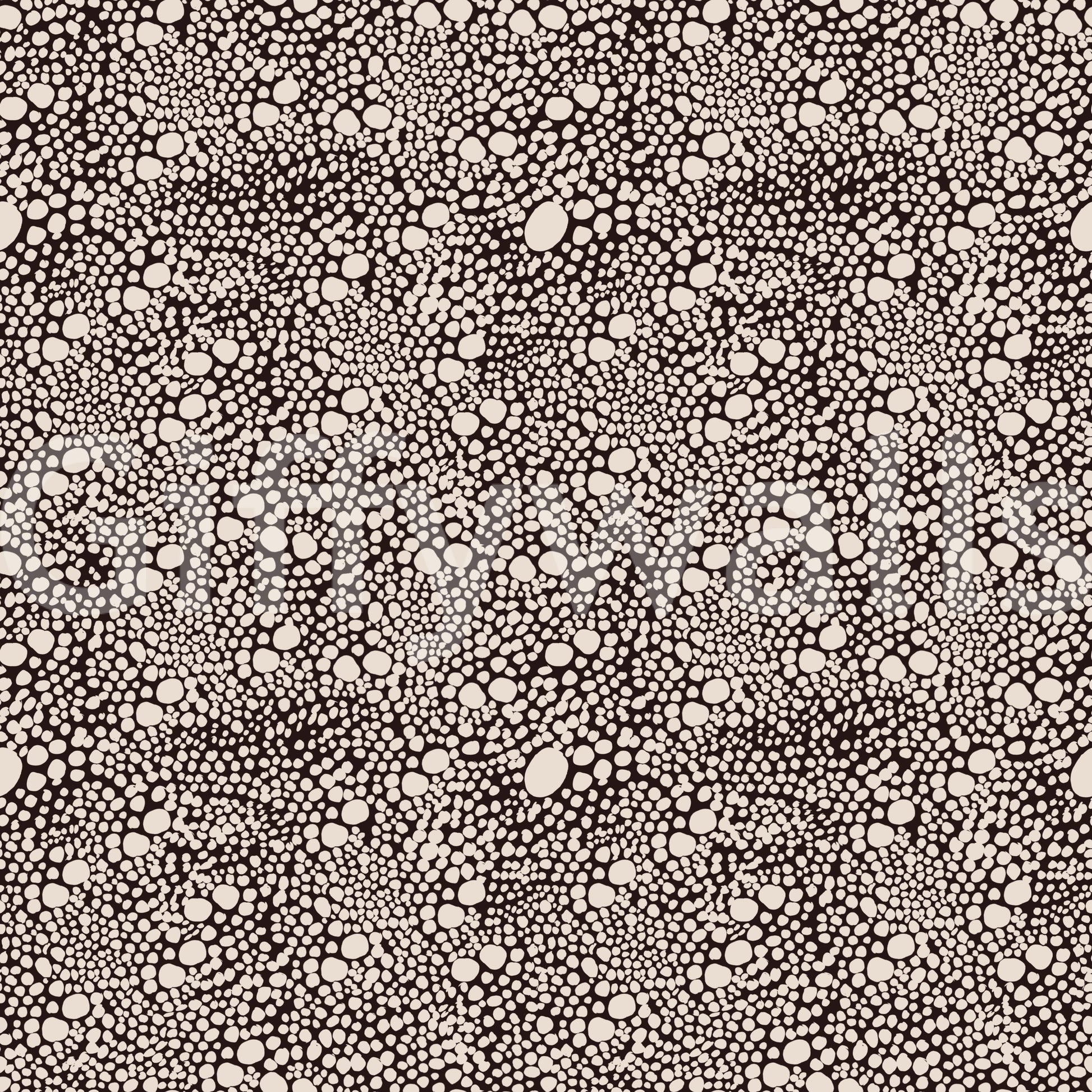 Each rounded form in the pebble wallpaper differs in scale for a natural finish