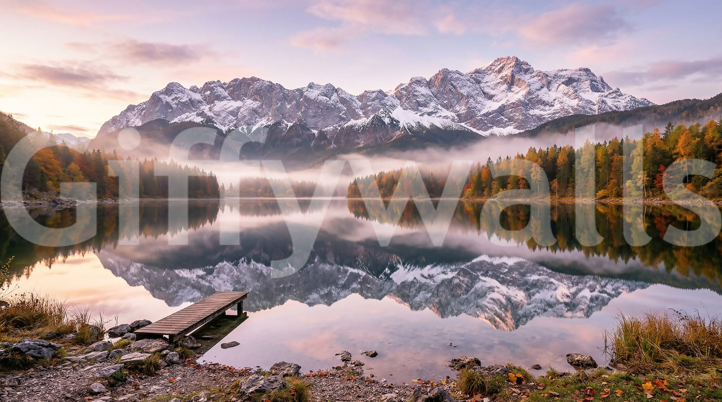 Rocky shoreline with fallen leaves in the foreground of the alpine wall mural