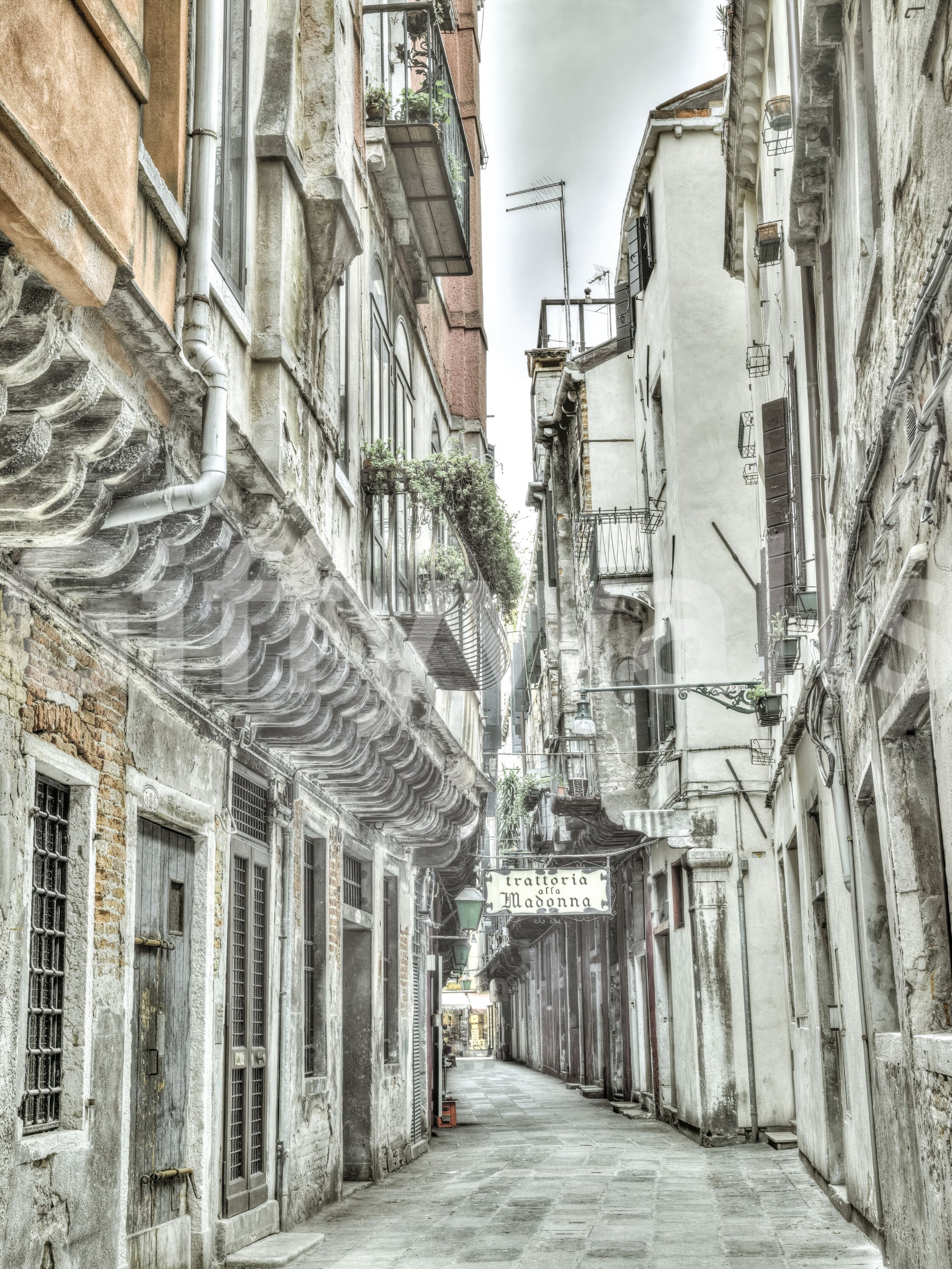 Weathered stucco surfaces of the Venetian Alley Whisper Wall Mural.