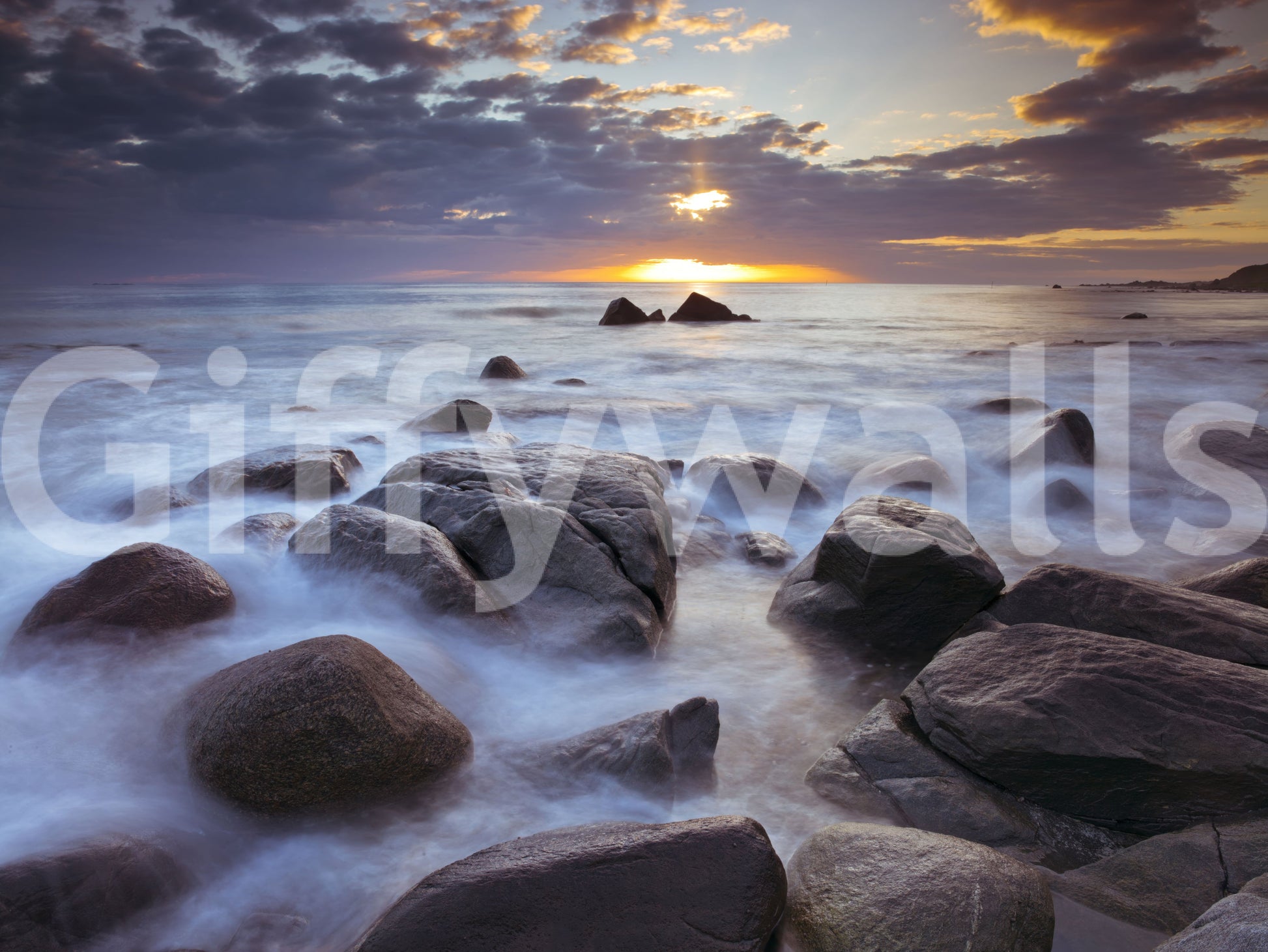 Rounded rocks scatter through the Rocky Splendor wall mural