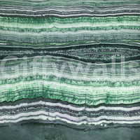 Ribbon-like stone striations stretch from edge to edge of the wall mural