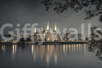 Architectural city wall mural with warm skyline lighting effects