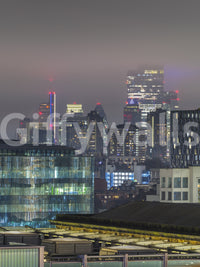 Metropolitan skyline wall mural featuring soft misty textures