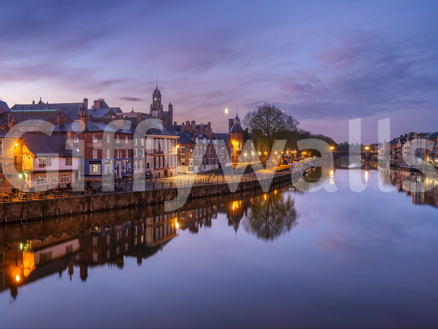 Riverfront wall mural featuring traditional architecture at dusk