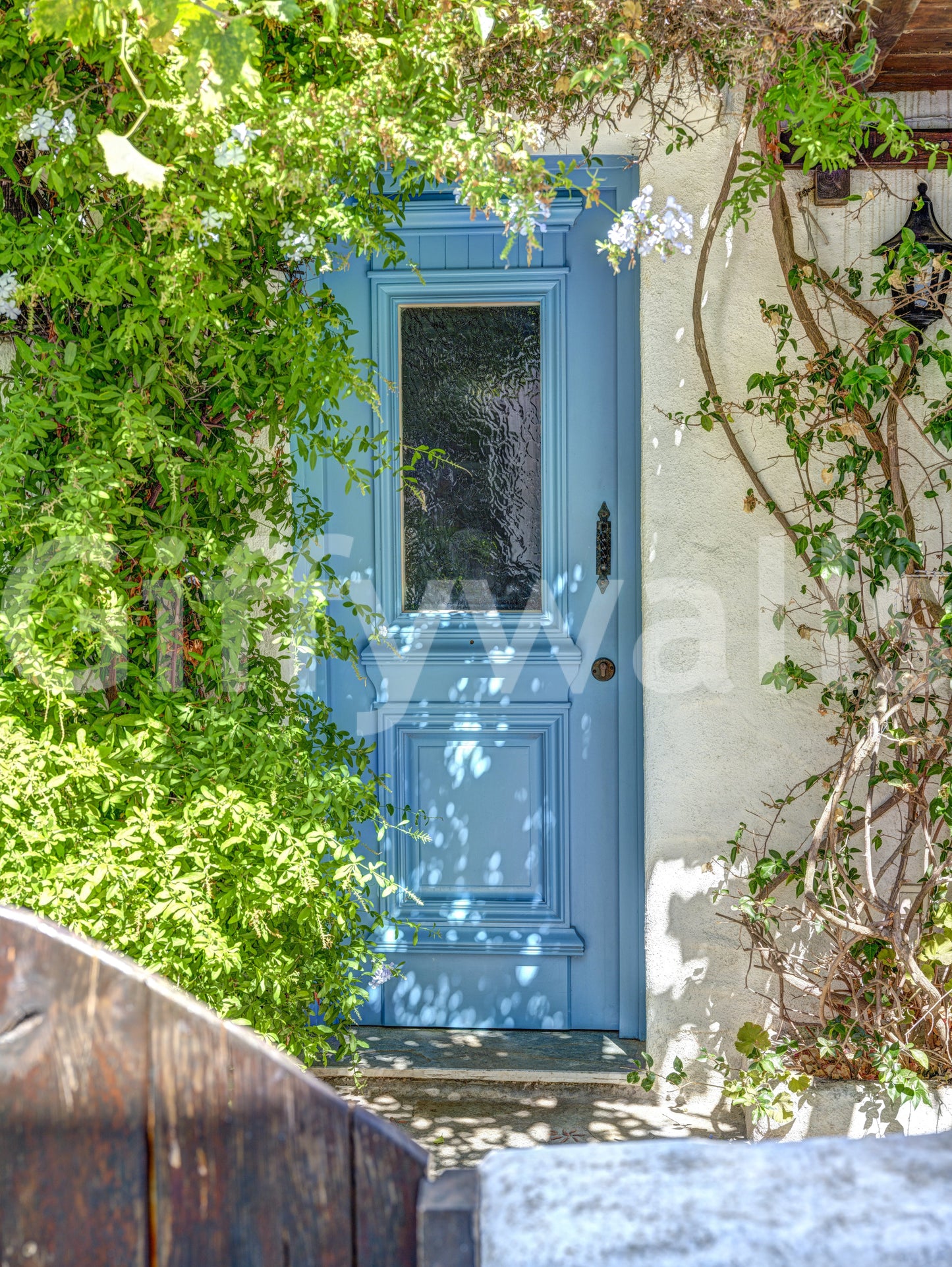 Architectural wall mural with vibrant doorway and textured walls