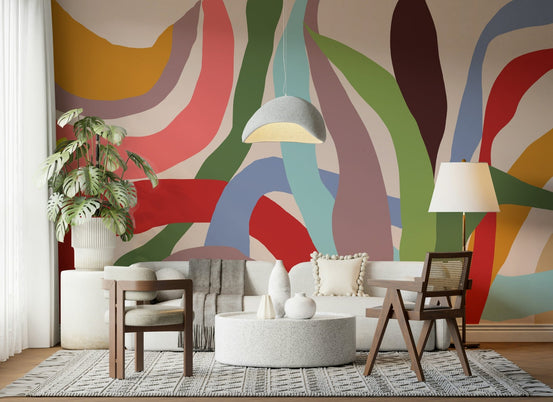 Waves of Joy wallpaper mural of colorful abstract waves behind a cream sofa and wood chairs