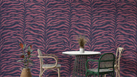 A close-up view of a wallpaper with a flowing, wavy stripe pattern.
