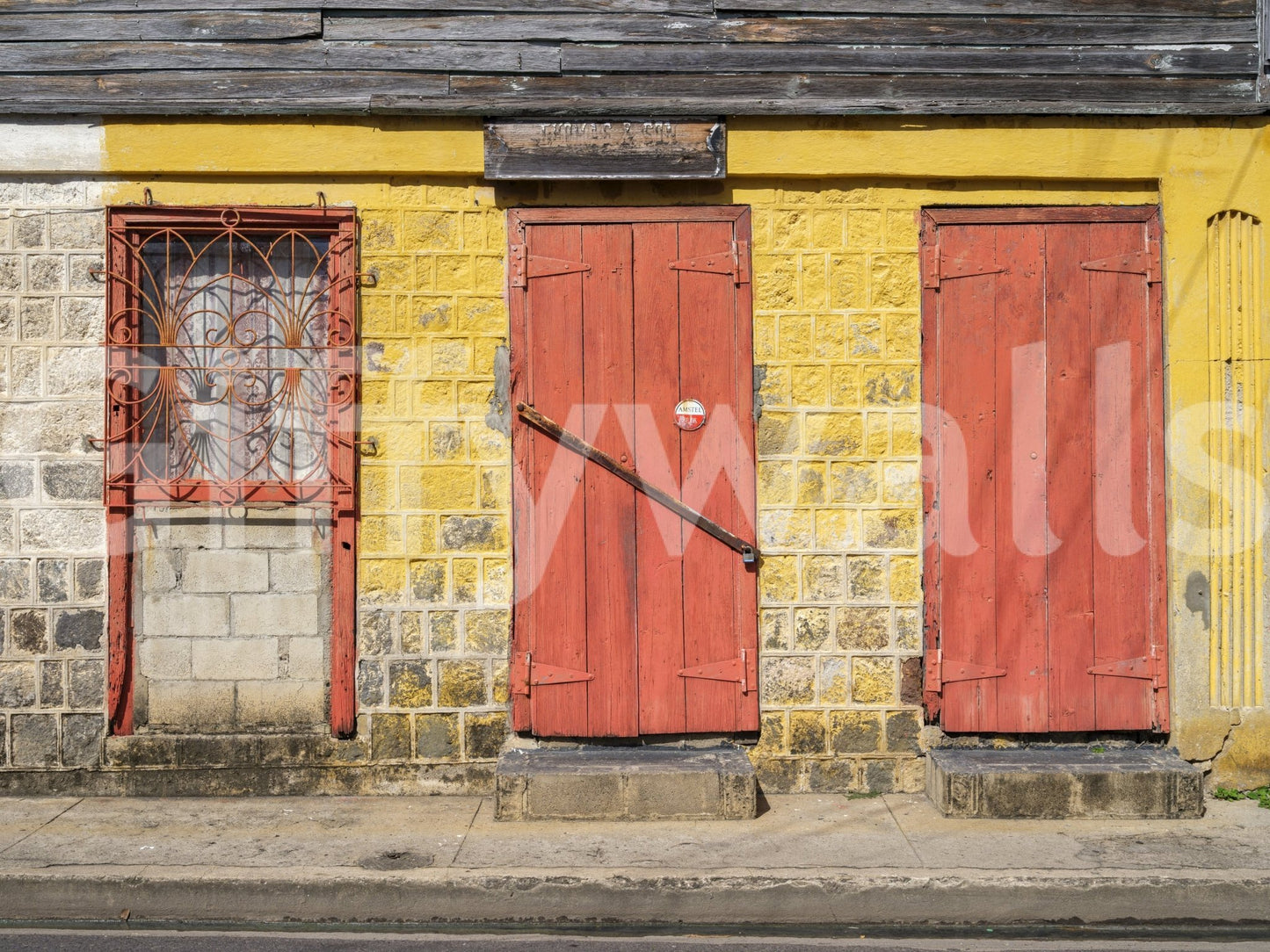 Detailed print of a weathered wall mural with red wooden doors