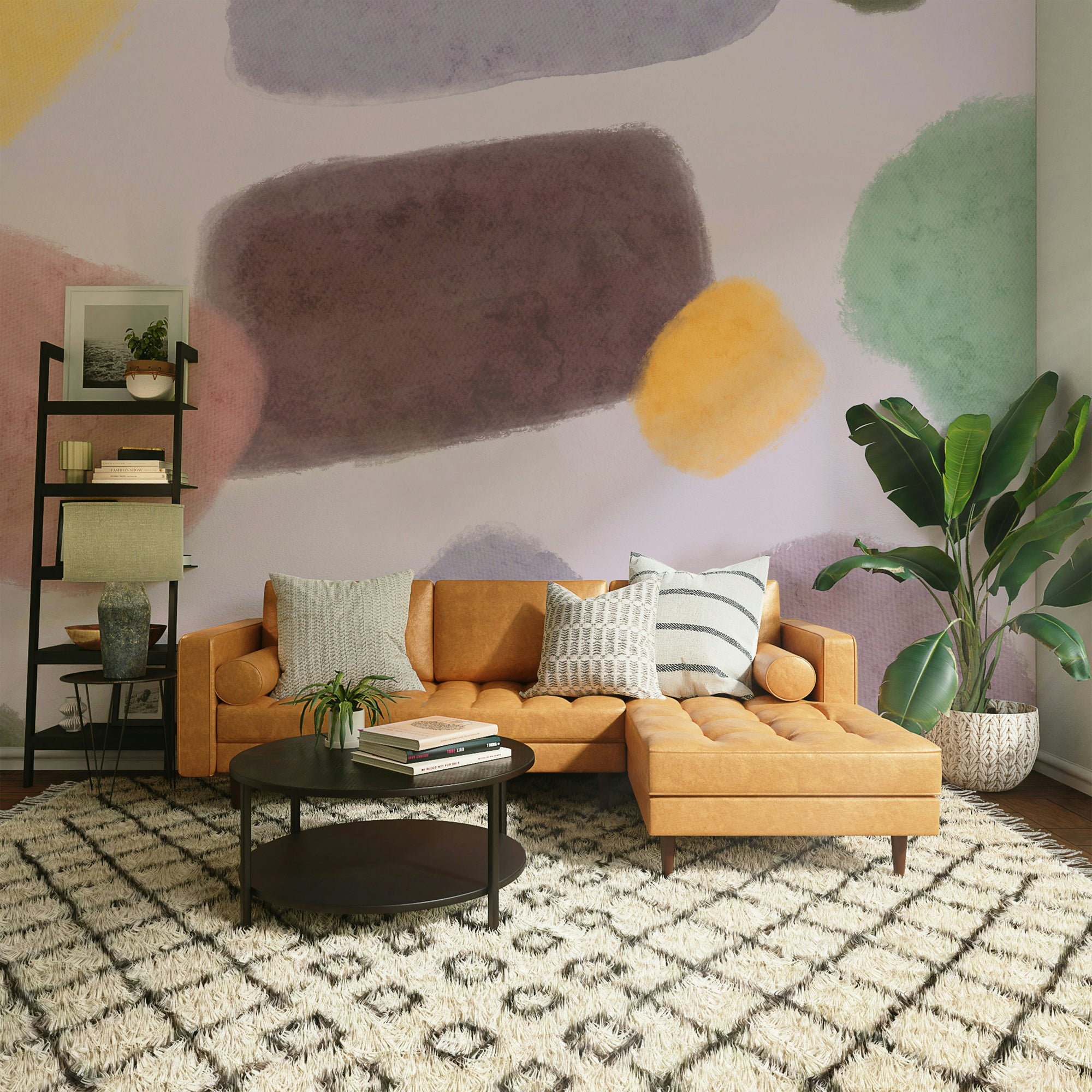 Whimsical Color Blend wallpaper mural of pastel watercolor blobs behind a caramel leather sofa in a living room