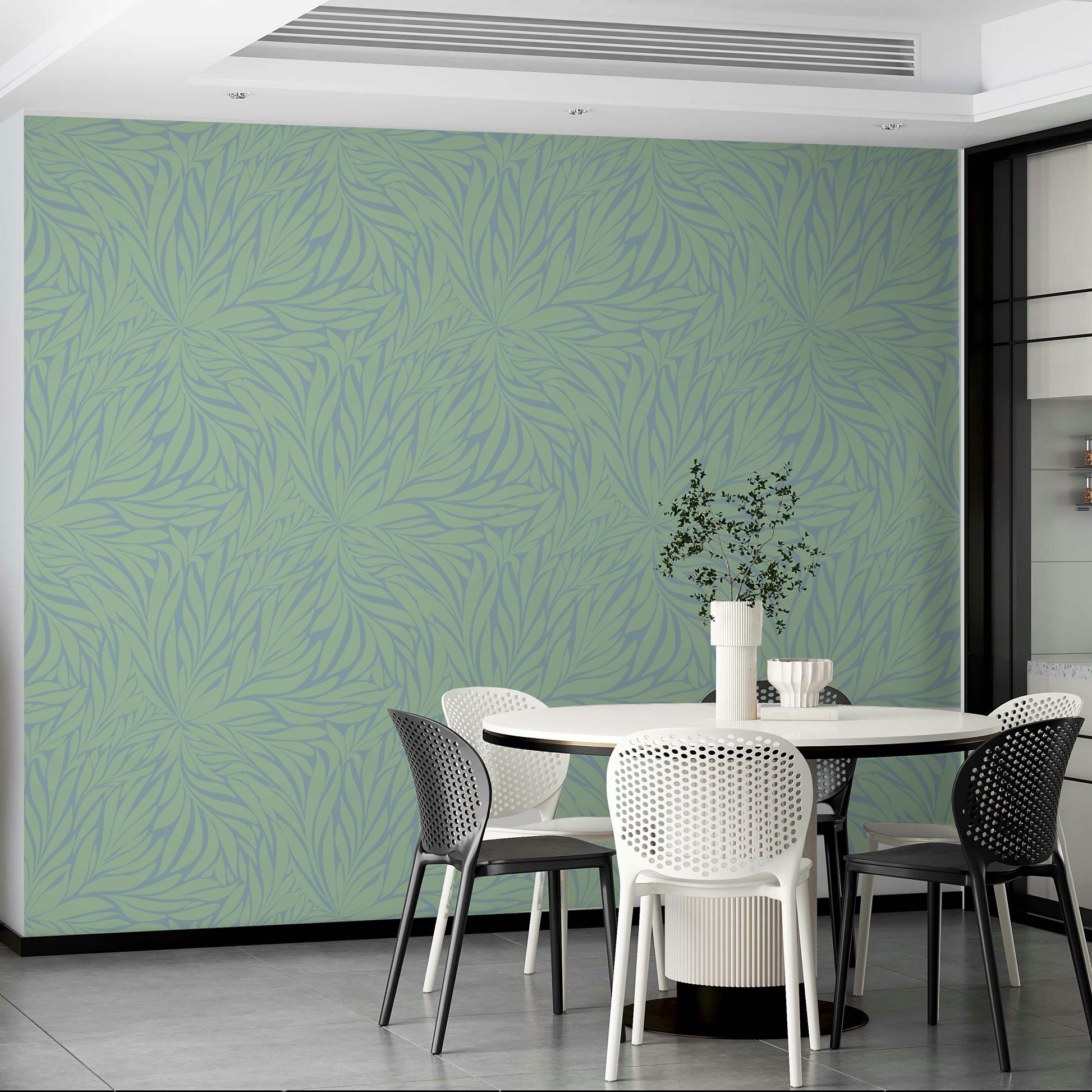 Light mural featuring floating leaf design

