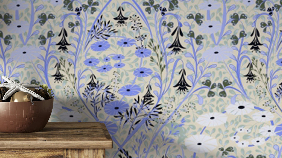 Whimsical Meadow Periwinkle wallpaper in blue and cream florals behind a copper bowl on a wooden console table