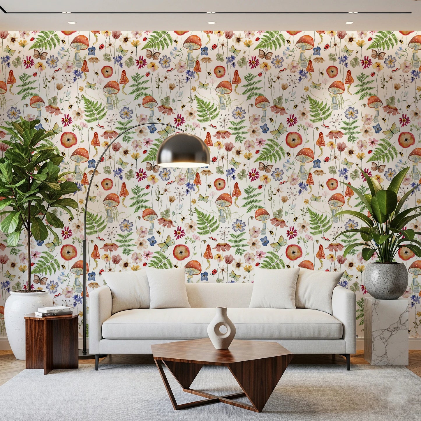 Whimsical Watercolor Meadow wallpaper mural in a living room with a white sofa, arc lamp and tall green plants