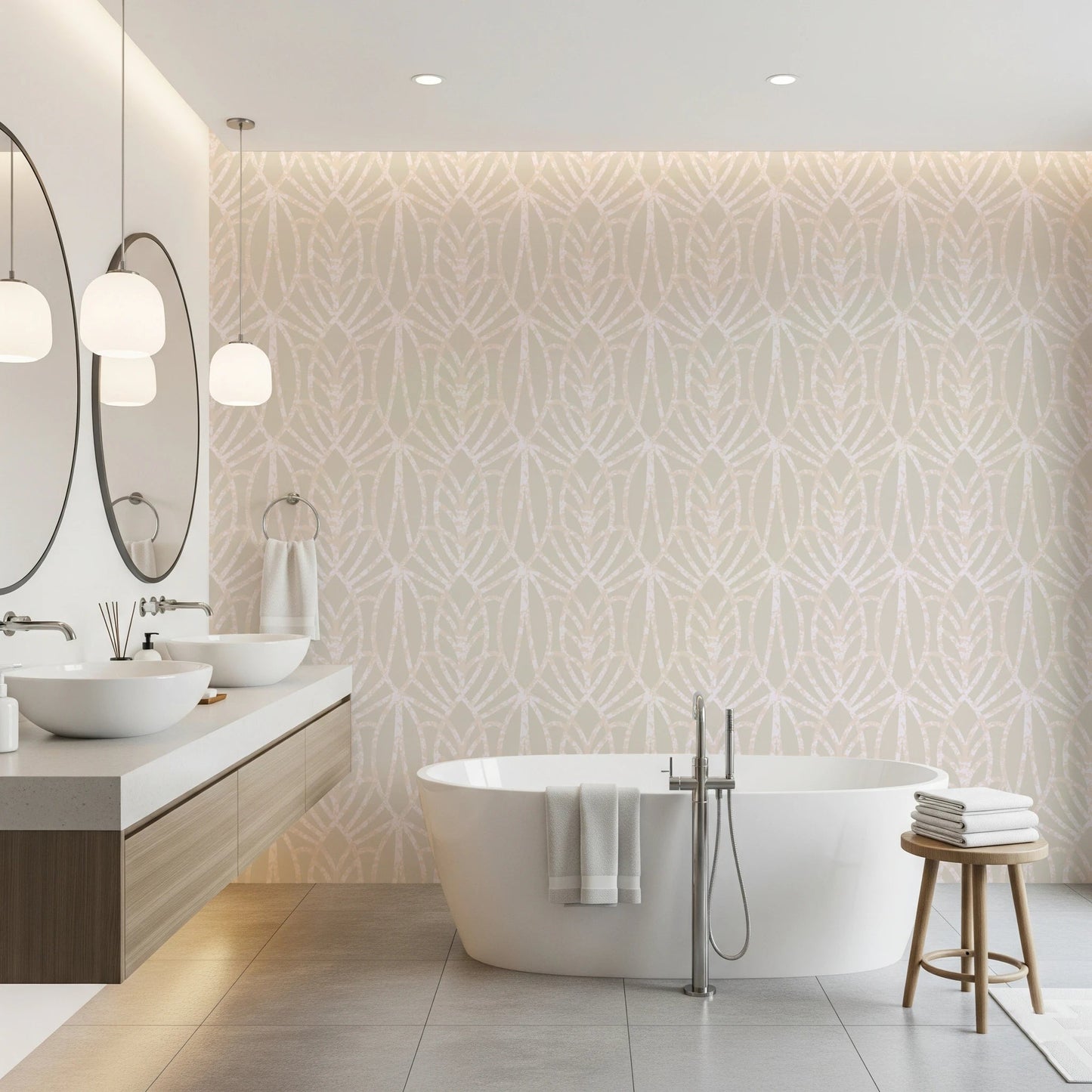 Whispered Arches wallpaper in soft beige with a pale Art Deco arch pattern behind a freestanding white tub in a bathroom