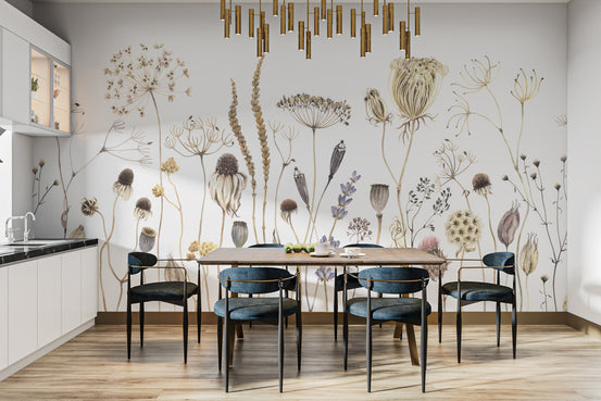 Whispering Meadows wallpaper mural of dried wildflowers behind a wood dining table with blue chairs in a kitchen