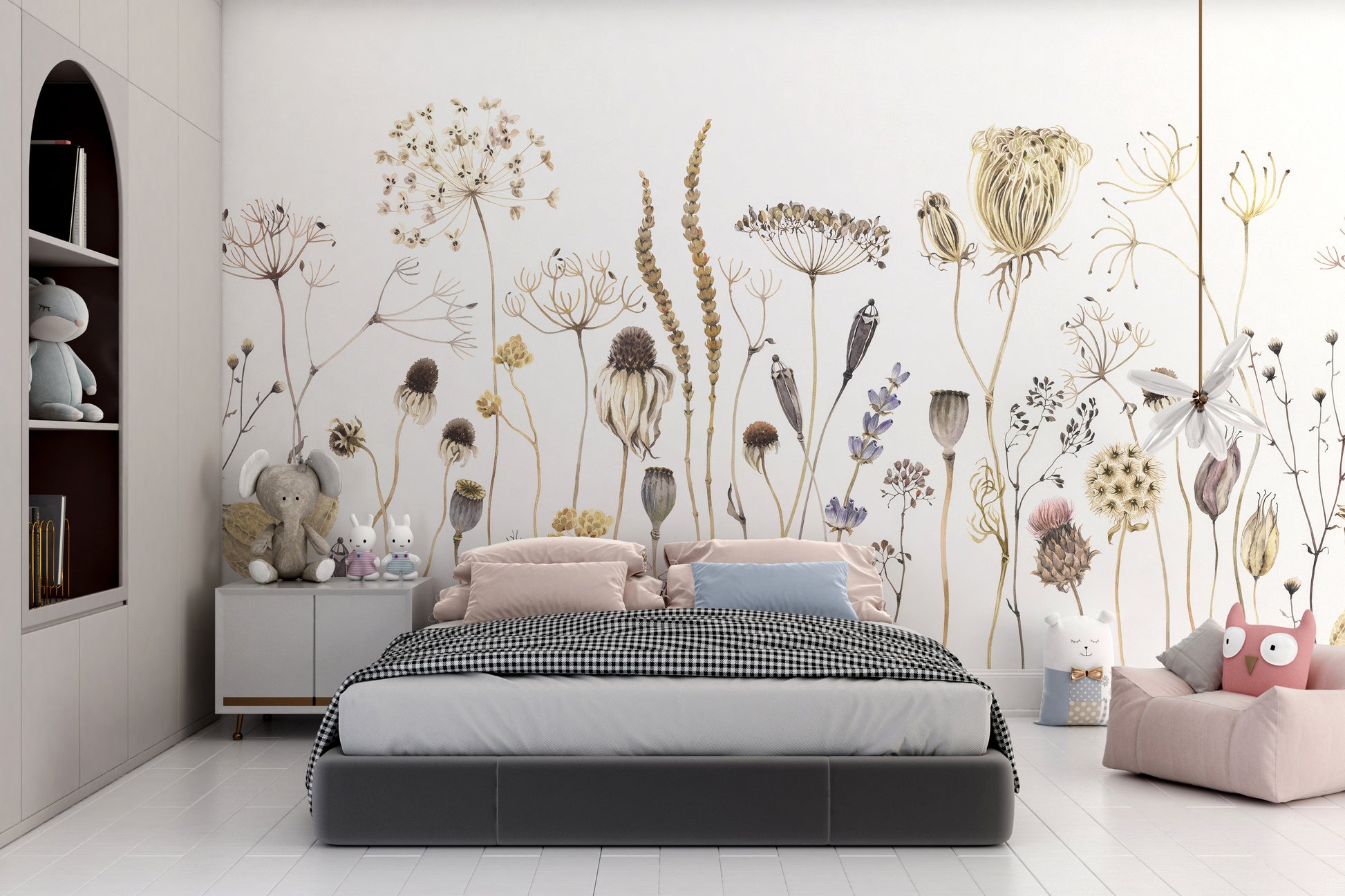 Whispering Meadows wallpaper mural of pastel wildflowers above a kids bed with pink pillows and plush toys