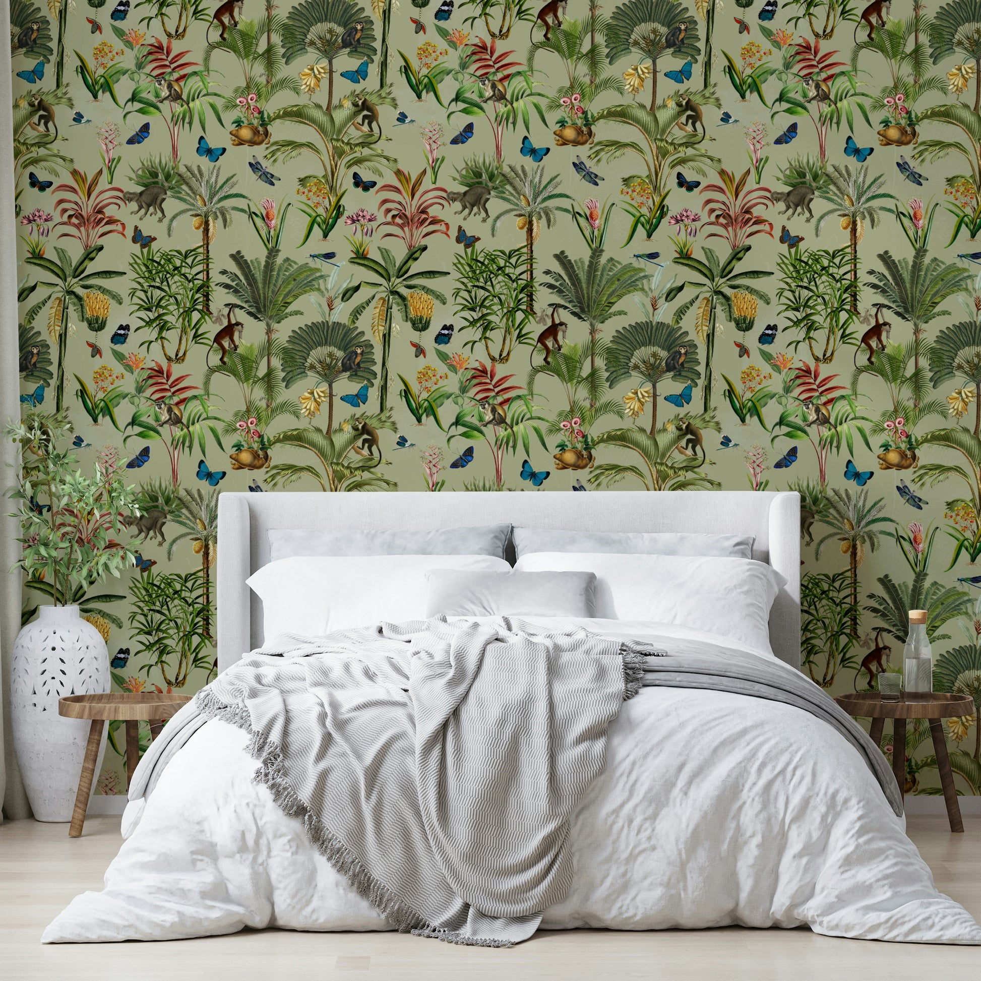 Whimsical jungle mural with pastel botanical elements.

