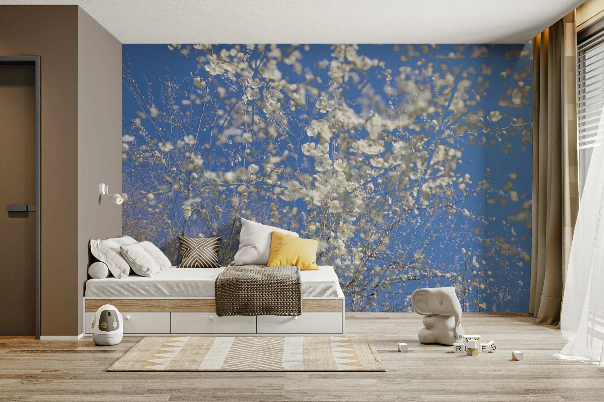 White Blossoms Against a Clear Blue Sky spring photography wall mural in a kids bedroom with white daybed and elephant figurine